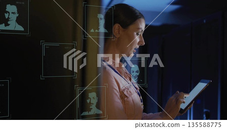 Interacting technician tapping tablet in data center, with holographic panels and racks, copy space Interacting technician tapping tablet in data center, with holographic panels and racks, copy space 135588775