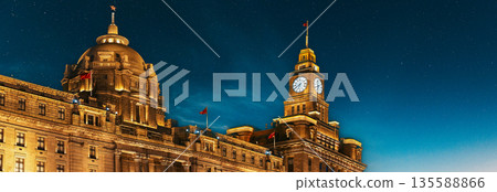 Shanghai, China. Clock tower of Shanghai, soaring beautifully at night. The Bund, Shanghai Custom House Building, The Clock Tower. Shanghai, China. Clock tower of Shanghai, soaring beautifully at night. The Bund, Shanghai Custom House Building, The Clock Tower. 135588866
