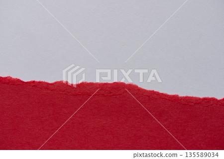 Torn red construction paper background 135589034