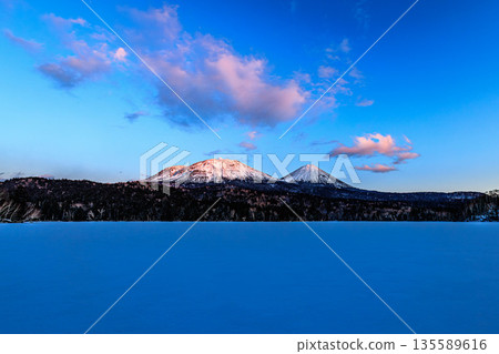 Akan Mashu National Park: Onneto and mountain shadows at dusk Akan Mashu National Park: Onneto and mountain shadows at dusk 135589616