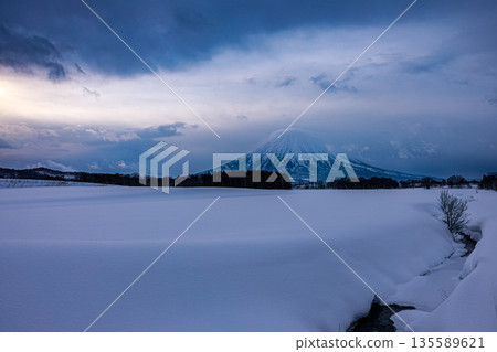 Mount Yotei stands in the silence of winter. Winter in Kutchan, Hokkaido 135589621
