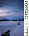 Mount Yotei towering over the snowy fields: Winter scenery in Kutchan, Hokkaido 135589626