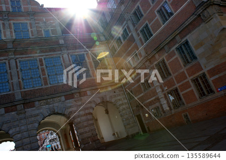 Old town square buildings in the market square Gdansk, Poland three archways Old town square buildings in the market square Gdansk, Poland three archways 135589644