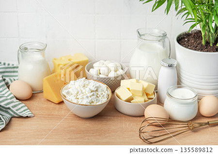 Assortment of fresh dairy products on wooden table Assortment of fresh dairy products on wooden table 135589812
