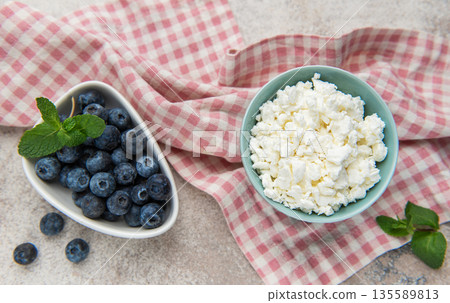 Cottage cheese and blueberries for healthy breakfast Cottage cheese and blueberries for healthy breakfast 135589813