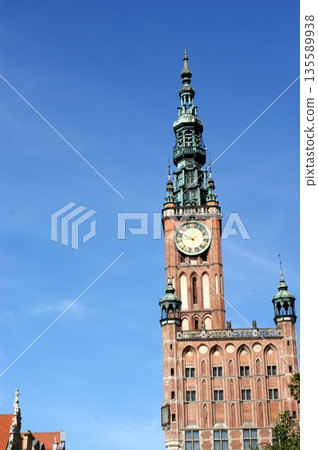 clock tower in a historic brick building clock tower in a historic brick building 135589938