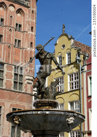 Triton statue on the market square in Gdansk in Poland Triton statue on the market square in Gdansk in Poland 135590004