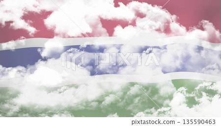 Displaying stylized flag of Gambia design in digital sky environment, with white cloud formations 135590463