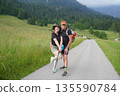 Couple Enjoying a Scenic Hike in the Countryside 135590784