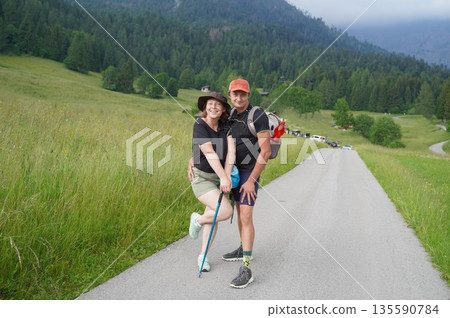 Couple Enjoying a Scenic Hike in the Countryside 135590784