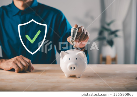 global economic money bank piggy finance concept shows man putting banknote into white piggy bank for growth, secure business invest stock strategy helps save wealth and capital global economic money bank piggy finance concept shows man putting banknote into white piggy bank for growth, secure business invest stock strategy helps save wealth and capital 135590963