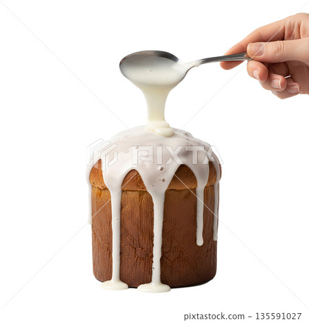 Action shot of hand pouring smooth white glaze or icing over a simple baked cake, isolated. Perfect for baking tutorials and homemade desserts Action shot of hand pouring smooth white glaze or icing over a simple baked cake, isolated. Perfect for baking tutorials and homemade desserts 135591027