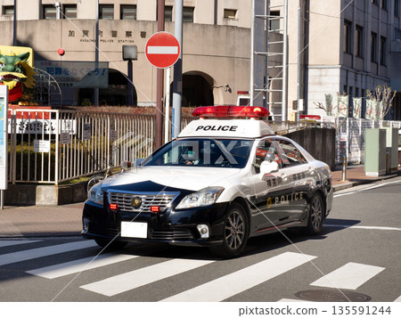 Police car during patrol Police car during patrol 135591244
