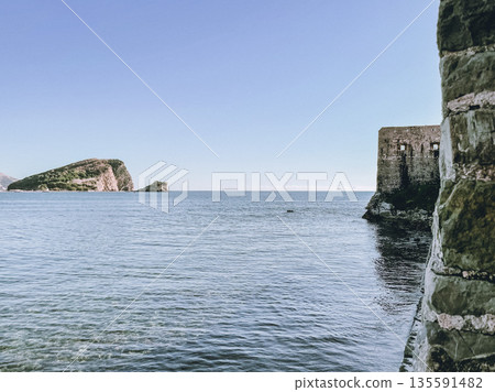 sunlit waves and distant islands, expansive horizon invites adventure and journeying beyond shores 135591482