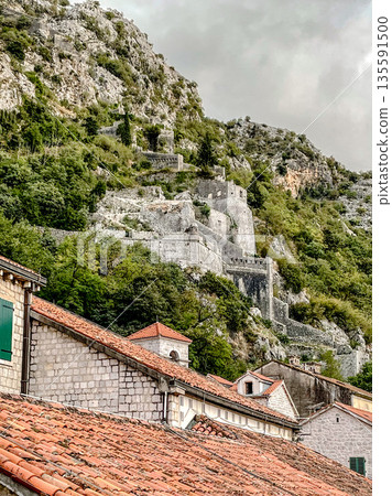 The Historic Ruins Are Located on a Beautiful Hillside Overlooking Traditional Rooftops Nearby The Historic Ruins Are Located on a Beautiful Hillside Overlooking Traditional Rooftops Nearby 135591500