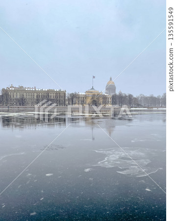 A Tranquil Journey Through Wintery Reflections in a Beautiful and Snowy Cityscape A Tranquil Journey Through Wintery Reflections in a Beautiful and Snowy Cityscape 135591549