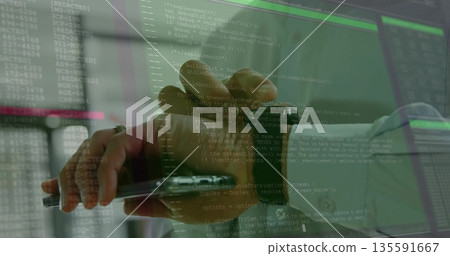 IT pro's hand pointing stylus at tablet in IT office, with smartwatch and monitors displaying code 135591667