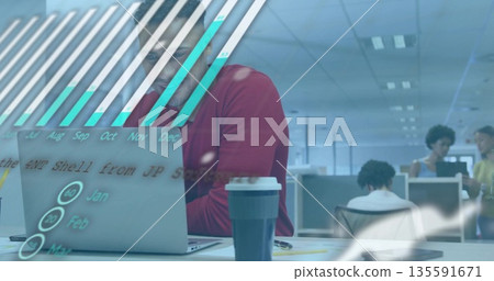 Working red-sweatered man with glasses analyzing laptop data in open-plan office holding coffee cup Working red-sweatered man with glasses analyzing laptop data in open-plan office holding coffee cup 135591671