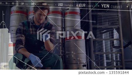 Inspecting worker wearing overalls adjusting glove on keg in storage area, with chart overlay Inspecting worker wearing overalls adjusting glove on keg in storage area, with chart overlay 135591844