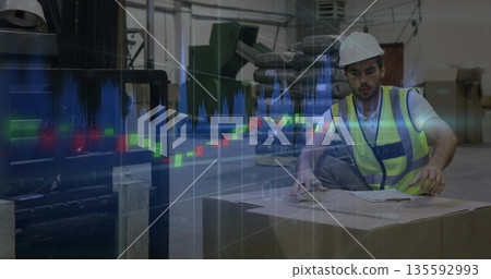 Kneeling worker wearing vest writing on clipboard beside box with forks under overlay, copy space Kneeling worker wearing vest writing on clipboard beside box with forks under overlay, copy space 135592993