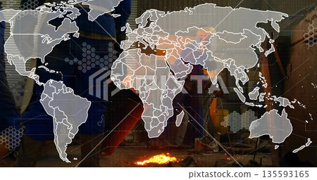 Forging molten metal, male metalworker standing at foundry workshop with digital network overlay 135593165