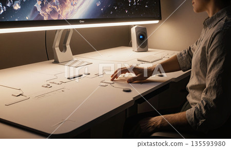 Tactile Interface Command Center. A home office where the entire desk is a single, seamless surface made of a tactile Tactile Interface Command Center. A home office where the entire desk is a single, seamless surface made of a tactile 135593980
