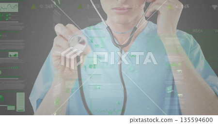 Doctor wearing blue scrubs holding stethoscope chestpiece in simulation, with holographic overlays 135594600
