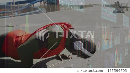 Performing push-ups man wearing red workout shirt on basketball court, with hoop, financial overlay Performing push-ups man wearing red workout shirt on basketball court, with hoop, financial overlay 135594703