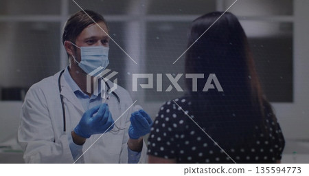 Explaining treatment, male doctor guiding patient in clinic wearing mask and gloves, copy space Explaining treatment, male doctor guiding patient in clinic wearing mask and gloves, copy space 135594773