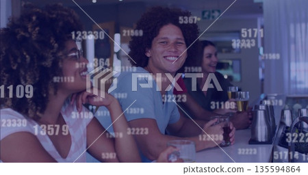 Smiling friends chatting over beer at modern pub counter, with steel taps and data overlays Smiling friends chatting over beer at modern pub counter, with steel taps and data overlays 135594864