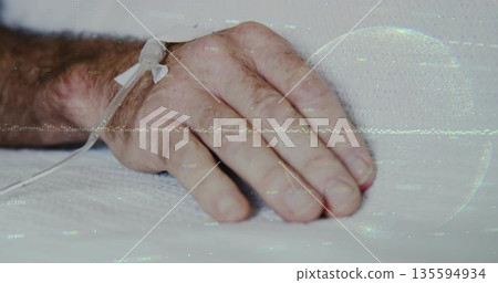 Showing senior male hand resting on white sheet in hospital room, with taped IV catheter Showing senior male hand resting on white sheet in hospital room, with taped IV catheter 135594934