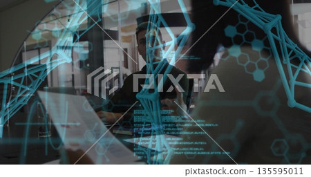 Reviewing molecular data on display, man collaborating in glass-walled conference room with laptop 135595011