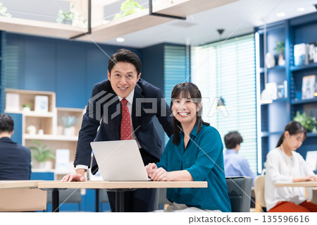 Business woman working in the office 135596616