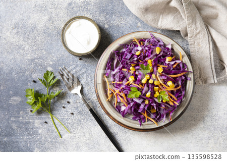 Fresh summer coleslaw with red cabbage, carrots, and corn - perfect for healthy meal planning and vegan dining Fresh summer coleslaw with red cabbage, carrots, and corn - perfect for healthy meal planning and vegan dining 135598528