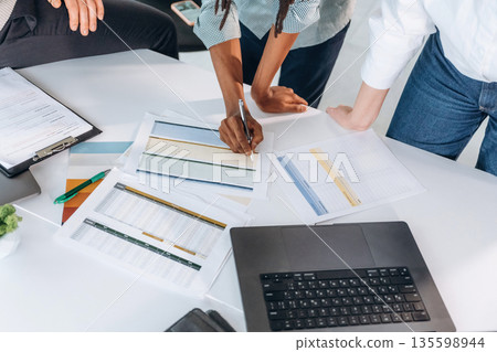 Top view of hands of business people Top view of hands of business people 135598944