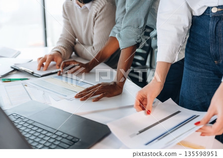 People are working in the office together People are working in the office together 135598951