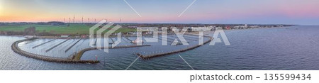 Aerial panorama of Groemitz marina and coastline at sunset 135599434