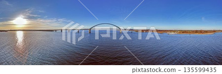 Wide panoramic view of Fehmarnbelt bridge across Baltic Sea Wide panoramic view of Fehmarnbelt bridge across Baltic Sea 135599435