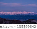 The Northern Alps Morgenrot before dawn from Minenohara Plateau in winter 135599642
