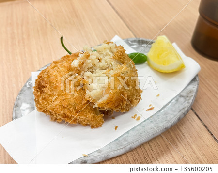 A croquette made with white shrimp, a famous product of Toyama Prefecture, Japan. A croquette made with white shrimp, a famous product of Toyama Prefecture, Japan. 135600205