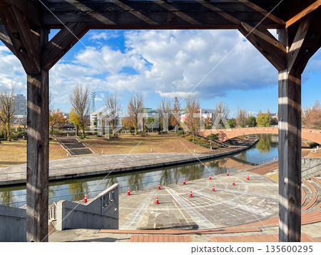 A view of Toyama City, Toyama Prefecture. Fugan Canal Kansui Park seen from the outdoor theater. 135600295