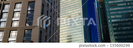 Modern city skyscrapers building facade background Modern city skyscrapers building facade background 135600299
