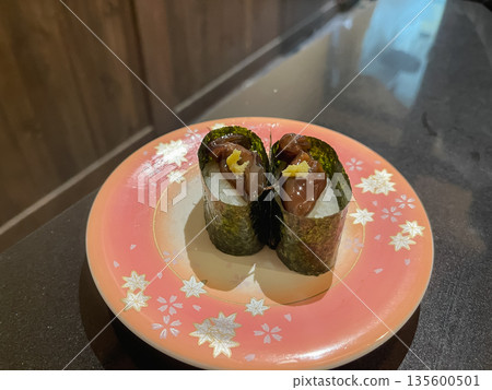 Japanese sushi. Gunkan roll sushi with fresh soy sauce marinated firefly squid. 135600501