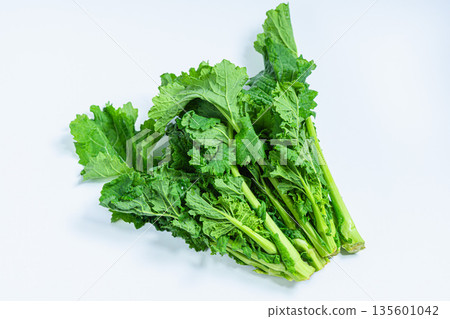 Rape blossoms white background spring vegetable material Rape blossoms white background spring vegetable material 135601042