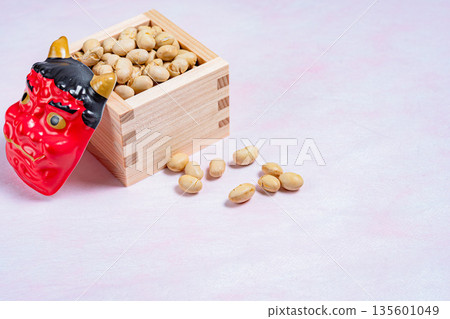 Red demon mask and Setsubun beans in a wooden box Red demon mask and Setsubun beans in a wooden box 135601049