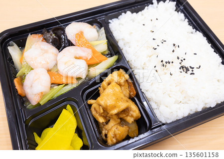 Delicious Chinese bento, fried shrimp and vegetables with salt bento Delicious Chinese bento, fried shrimp and vegetables with salt bento 135601158