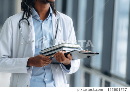 Close up view of doctor in coat indoors 135601757