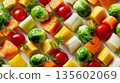 Colorful fresh vegetables display with brussels sprouts tomatoes and squash 135602069