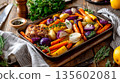 Roasted chicken with vegetables: carrots, potatoes, onions, and herbs on rustic tray 135602081