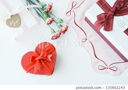 Gift: Red ribbon and heart gift box 135602243